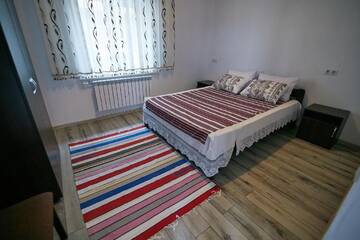 Фото номера Большой двухместный номер с 1 кроватью Гостевой дом Valea Stâncii г. Trebujeni 2